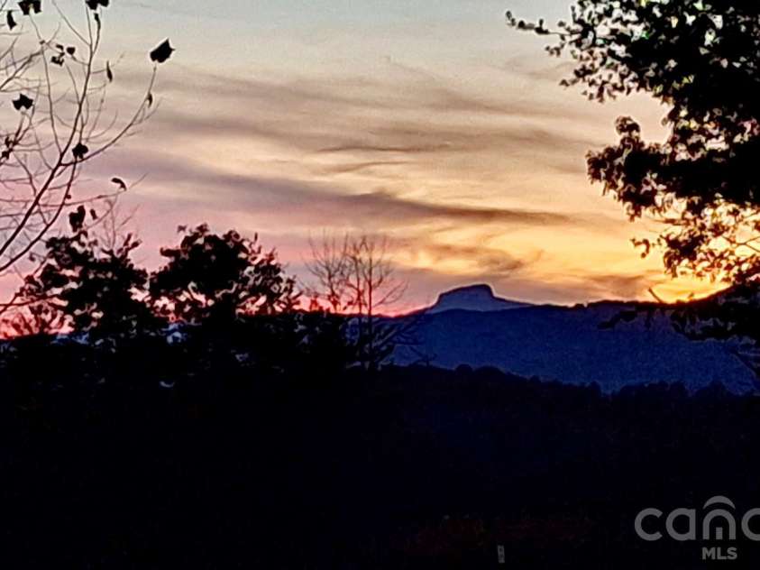 5564 Table View Lane, Lenoir, NC 28645.  MLS# CAR4380345, YatesRealty ID 27001. Table Rock view at sunset