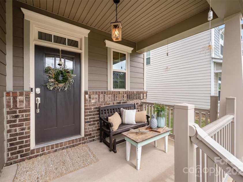 915 Claires Creek Lane, Davidson, NC 28036.  MLS# CAR4264930, YatesRealty ID 27003. Front Porch