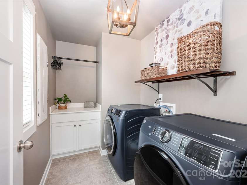 915 Claires Creek Lane, Davidson, NC 28036.  MLS# CAR4264930, YatesRealty ID 27003. Laundry Room