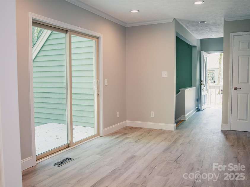 136 Day Drive, Boone, NC 28607.  MLS# CAR4270315, YatesRealty ID 27004. Access to back deck, looking toward den