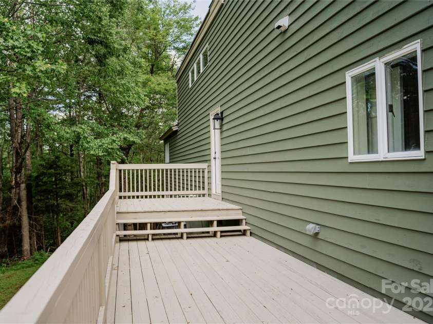 136 Day Drive, Boone, NC 28607.  MLS# CAR4270315, YatesRealty ID 27004. Back deck