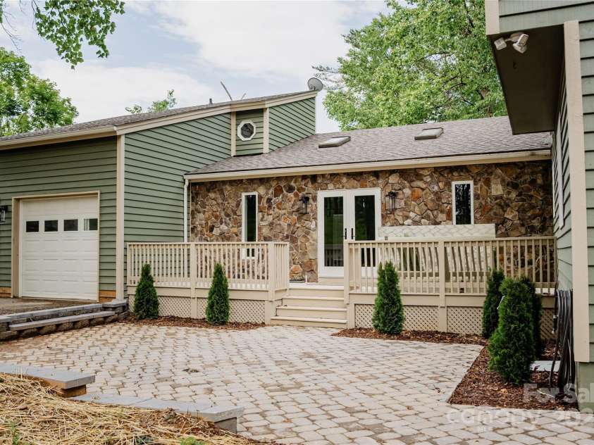 136 Day Drive, Boone, NC 28607.  MLS# CAR4270315, YatesRealty ID 27004. Front patio & front door