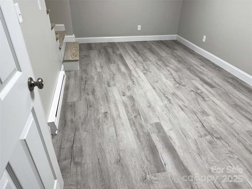 136 Day Drive, Boone, NC 28607.  MLS# CAR4270315, YatesRealty ID 27004. Lower-level living area/bonus room - low-maintenance LVP floors!