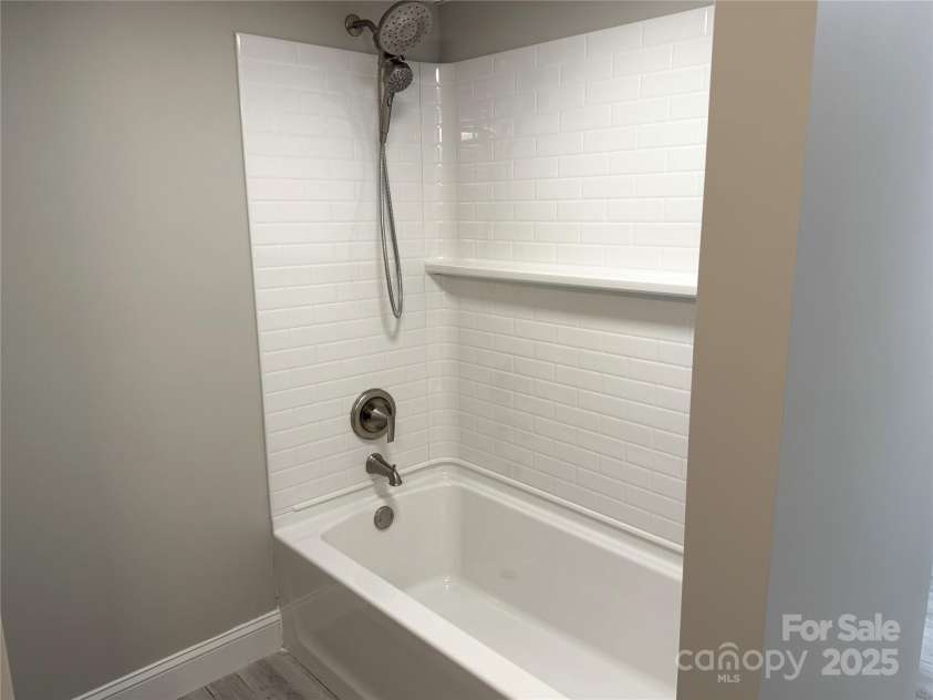 136 Day Drive, Boone, NC 28607.  MLS# CAR4270315, YatesRealty ID 27004. Lower-level suite full bath