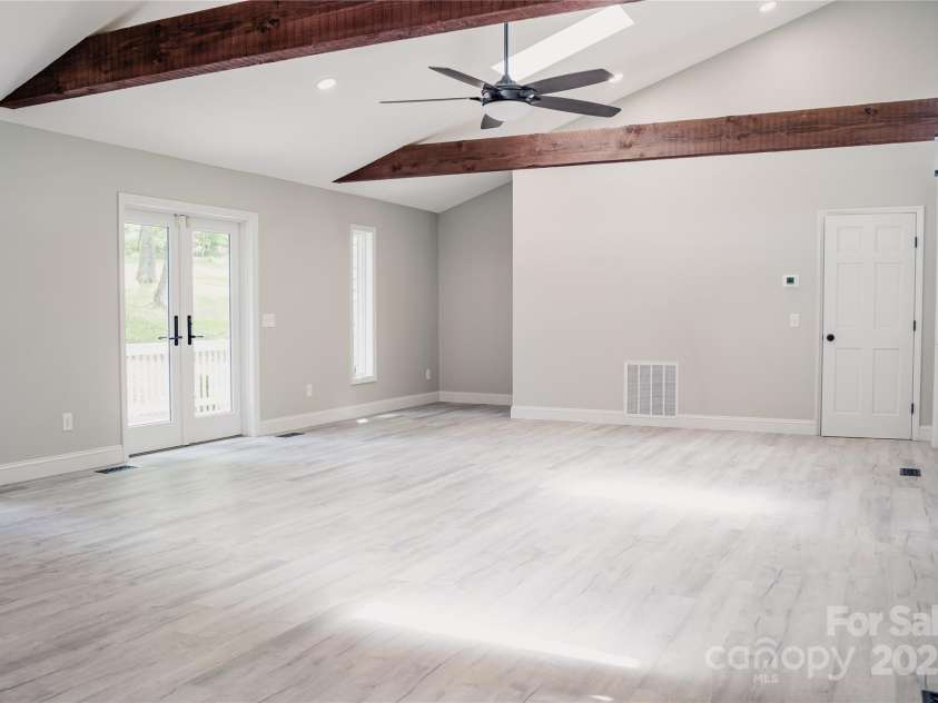 136 Day Drive, Boone, NC 28607.  MLS# CAR4270315, YatesRealty ID 27004. Open living & dining