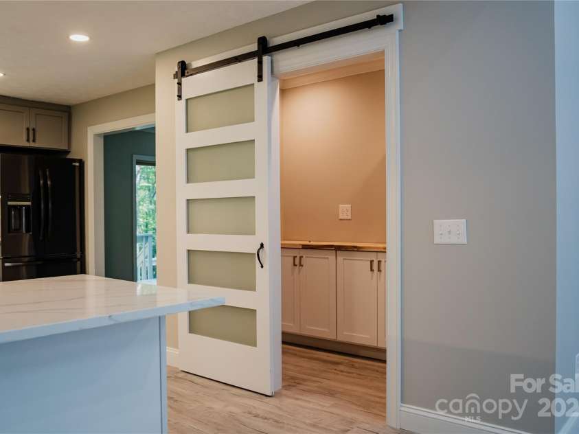 136 Day Drive, Boone, NC 28607.  MLS# CAR4270315, YatesRealty ID 27004. Pantry with storage & shelving!