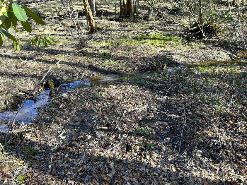 136 Day Drive, Boone, NC 28607.  MLS# CAR4270315, YatesRealty ID 27004. Stream frontage!