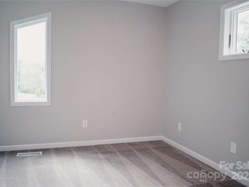 136 Day Drive, Boone, NC 28607.  MLS# CAR4270315, YatesRealty ID 27004. Upper-level suite (above garage)