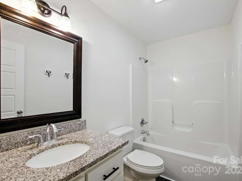 8782 Shepherd Court, Connelly Springs, NC 28612.  MLS# CAR4271884, YatesRealty ID 27006. Bathroom with Granite Countertops