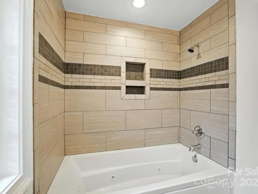 8782 Shepherd Court, Connelly Springs, NC 28612.  MLS# CAR4271884, YatesRealty ID 27006. Shower & Jetted Tub