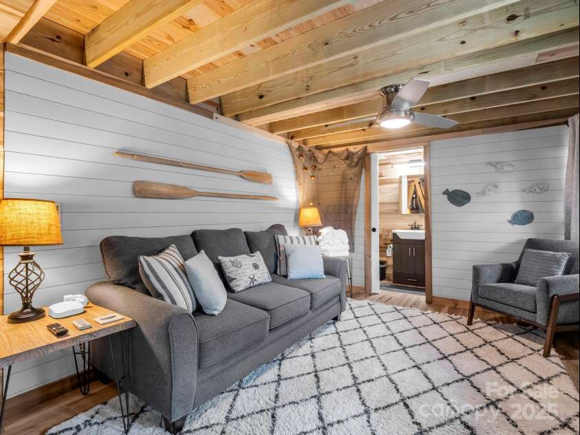 417 Tryon Bay Circle, Lake Lure, NC 28746.  MLS# CAR4279268, YatesRealty ID 27007. Basement Family Room