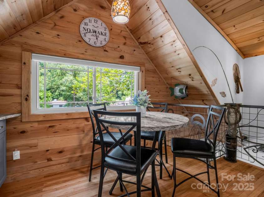 417 Tryon Bay Circle, Lake Lure, NC 28746.  MLS# CAR4279268, YatesRealty ID 27007. Dining with Lake Views