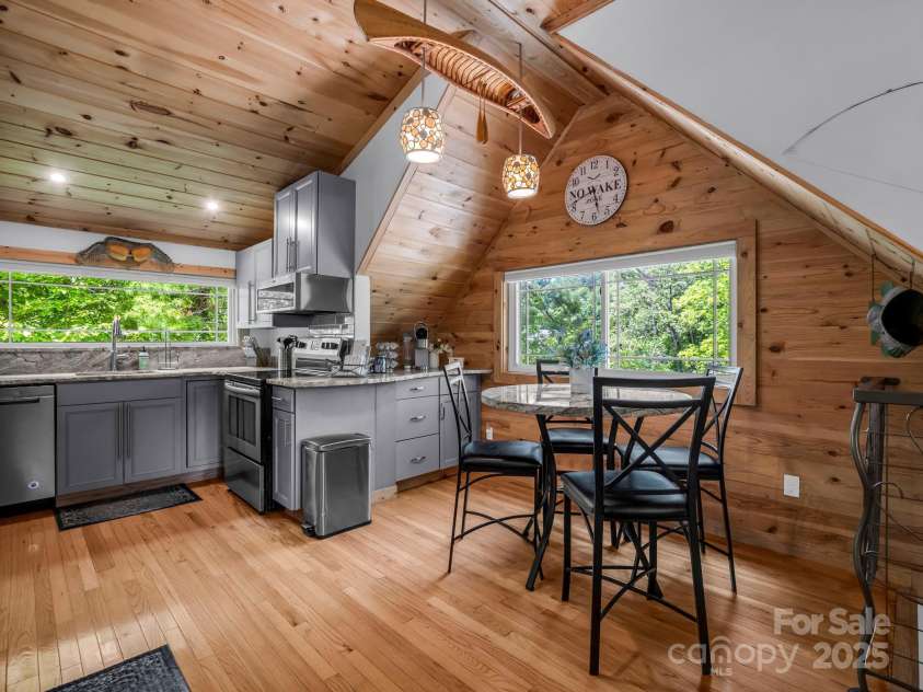 417 Tryon Bay Circle, Lake Lure, NC 28746.  MLS# CAR4279268, YatesRealty ID 27007. Kitchen & Dining