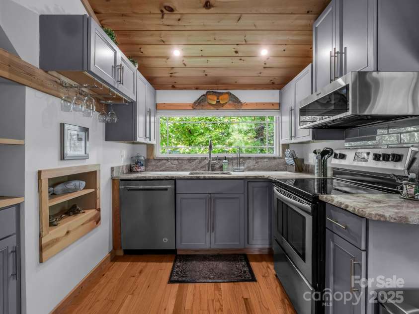 417 Tryon Bay Circle, Lake Lure, NC 28746.  MLS# CAR4279268, YatesRealty ID 27007. Kitchen with Lake Views