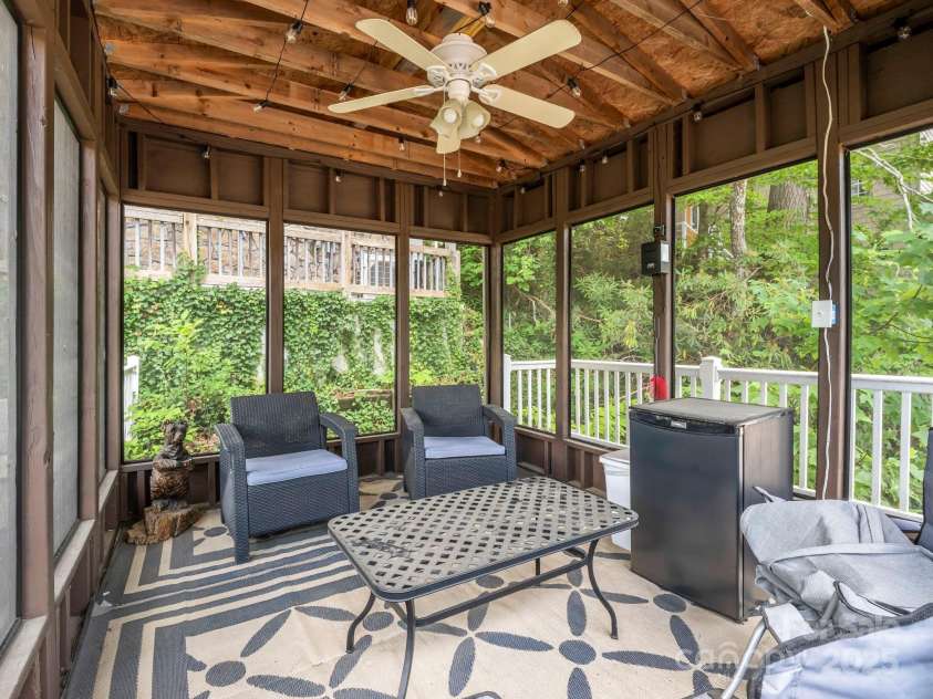 417 Tryon Bay Circle, Lake Lure, NC 28746.  MLS# CAR4279268, YatesRealty ID 27007. Screened porch