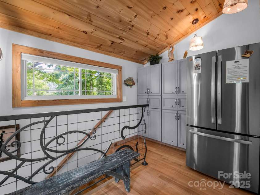 417 Tryon Bay Circle, Lake Lure, NC 28746.  MLS# CAR4279268, YatesRealty ID 27007. Staircase to Lower