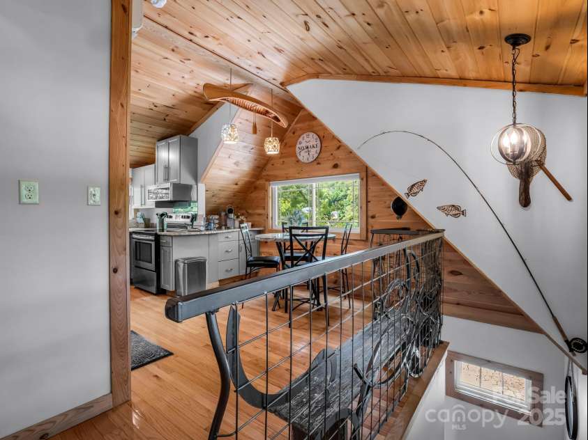 417 Tryon Bay Circle, Lake Lure, NC 28746.  MLS# CAR4279268, YatesRealty ID 27007. Staircase to Lower