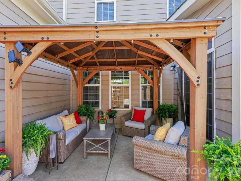 2020 Cramer Place Court, Cramerton, NC 28032.  MLS# CAR4368017, YatesRealty ID 27009. New cedar pergola stays!
