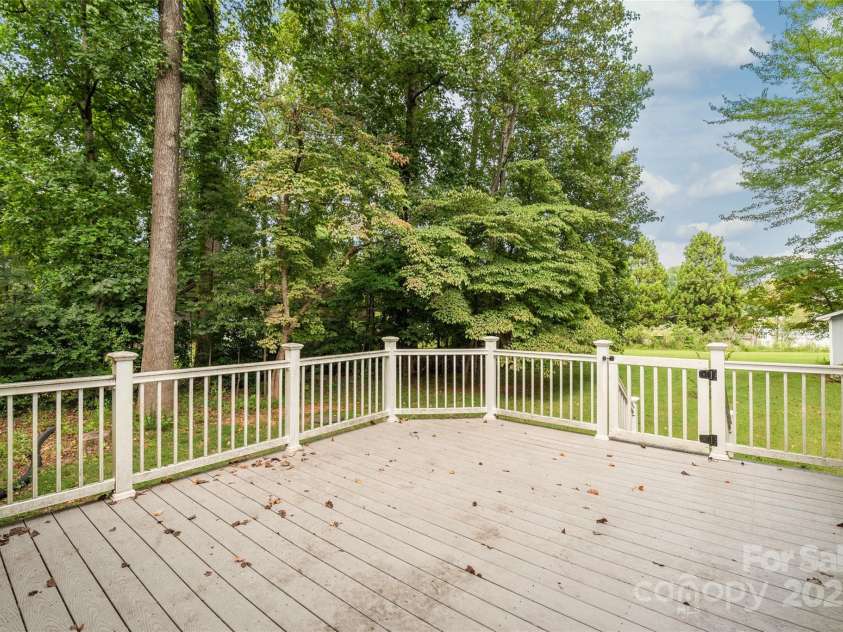 310 Oakwood Drive, Mount Holly, NC 28120.  MLS# CAR4297831, YatesRealty ID 2701. Back deck