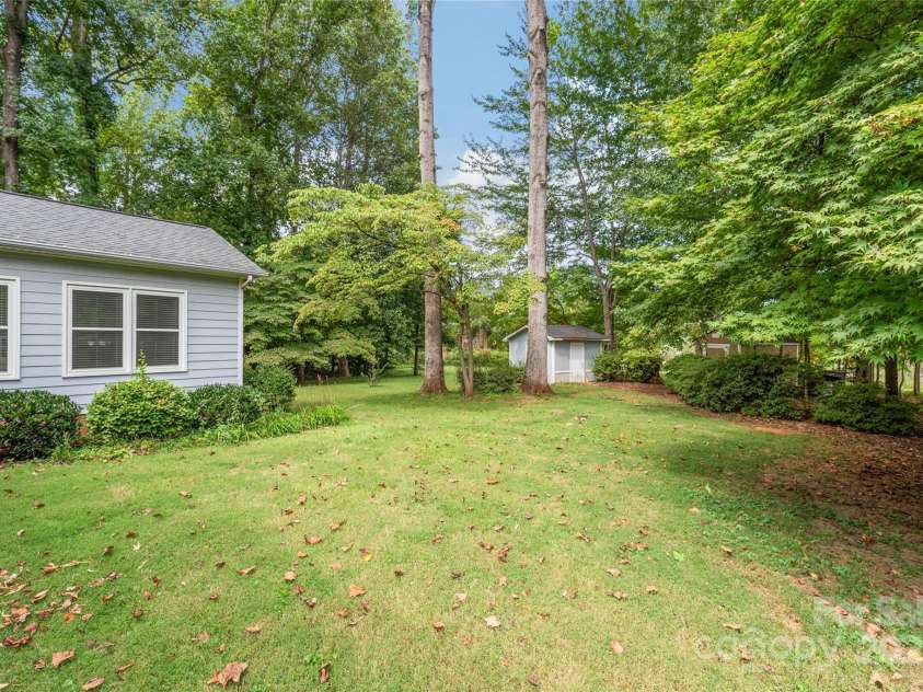 310 Oakwood Drive, Mount Holly, NC 28120.  MLS# CAR4297831, YatesRealty ID 2701. Back yard