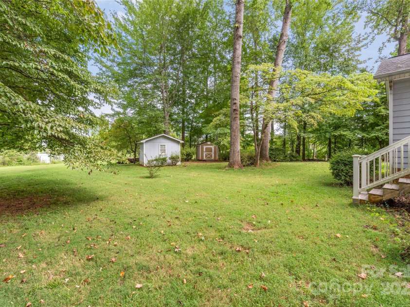 310 Oakwood Drive, Mount Holly, NC 28120.  MLS# CAR4297831, YatesRealty ID 2701. Back yard