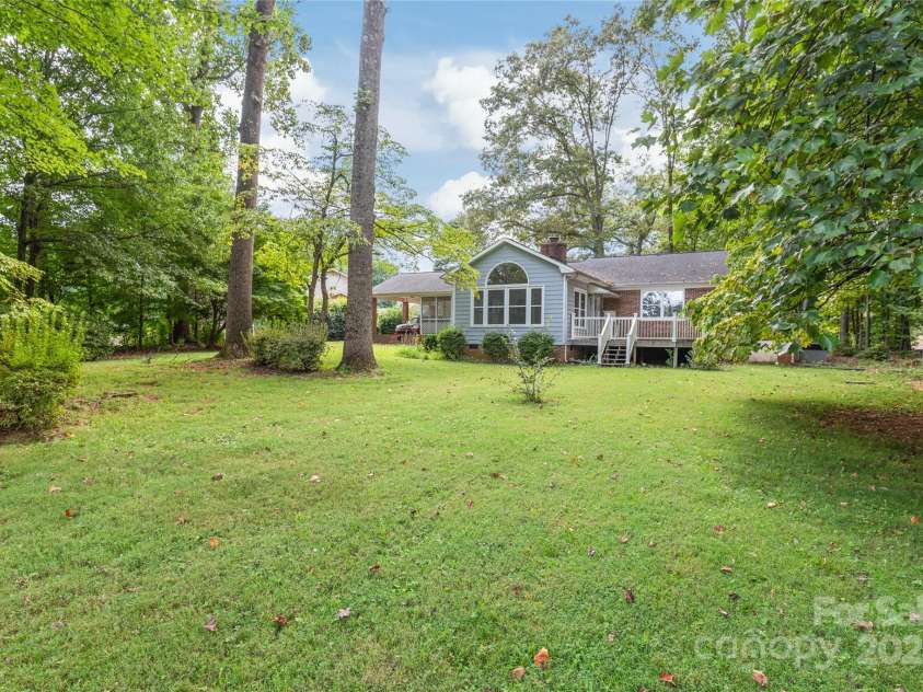310 Oakwood Drive, Mount Holly, NC 28120.  MLS# CAR4297831, YatesRealty ID 2701. Back yard