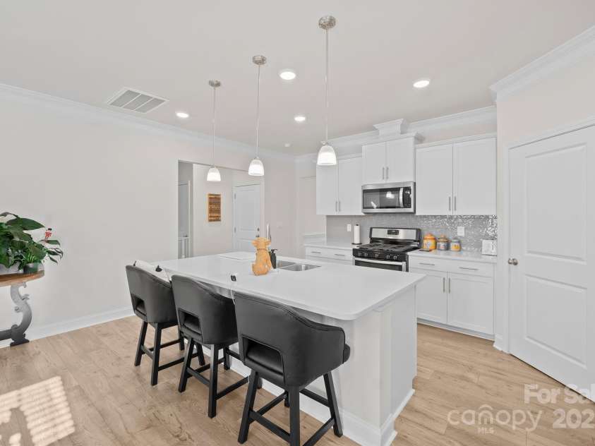 758 Latrobe Drive, Iron Station, NC 28080.  MLS# CAR4237714, YatesRealty ID 27013. Kitchen island