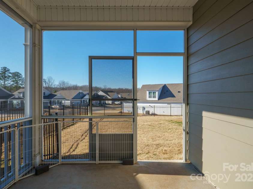 758 Latrobe Drive, Iron Station, NC 28080.  MLS# CAR4237714, YatesRealty ID 27013. Screened-in porch