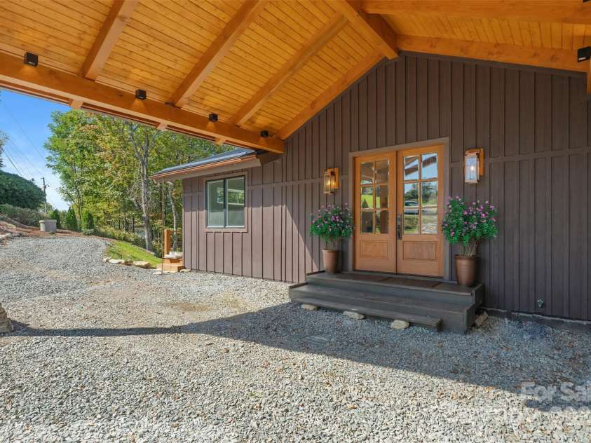 1075 Center Court Drive, Boone, NC 28605.  MLS# CAR4313256, YatesRealty ID 2702. Covered front entry and porte cochere