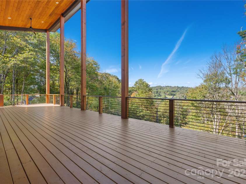 1075 Center Court Drive, Boone, NC 28605.  MLS# CAR4313256, YatesRealty ID 2702. Main-level deck