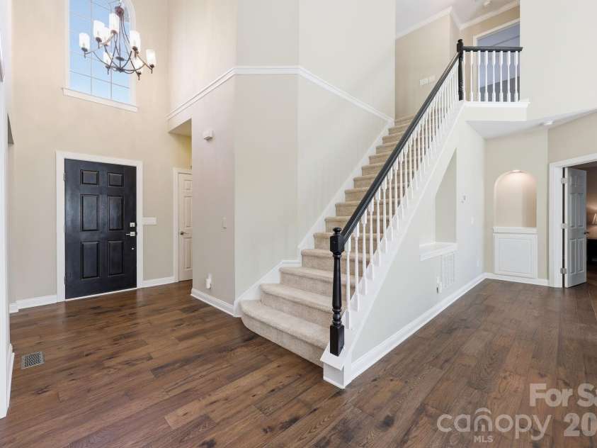 15704 Framingham Lane, Huntersville, NC 28078.  MLS# CAR4384574, YatesRealty ID 27020. Open staircase 