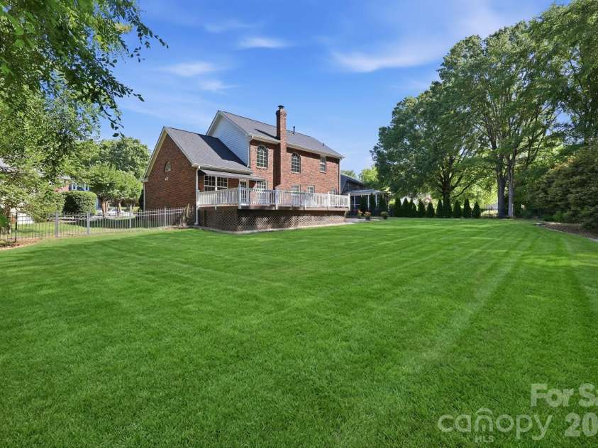 15704 Framingham Lane, Huntersville, NC 28078.  MLS# CAR4384574, YatesRealty ID 27020. Spacious wooded homesite - future pool?