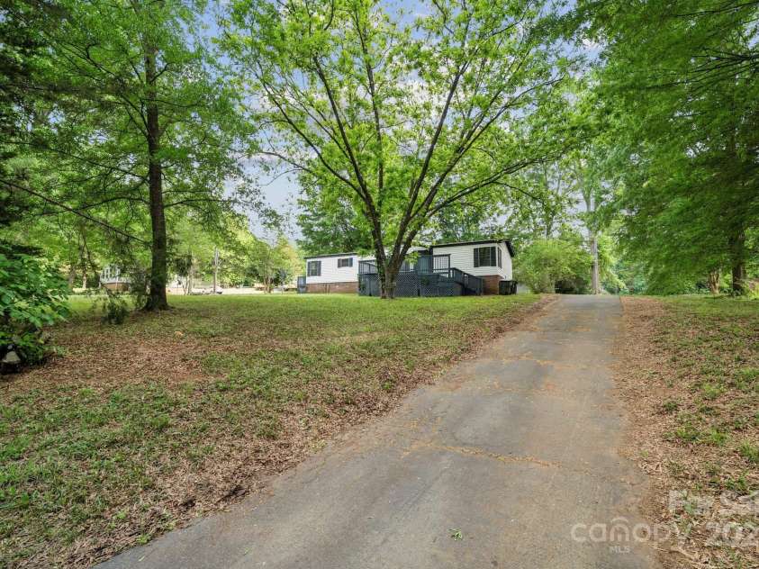 5001 Grand Canyon Road, Concord, NC 28027.  MLS# CAR4256169, YatesRealty ID 27021. Home sits on a Large 0.74 Acre lot!