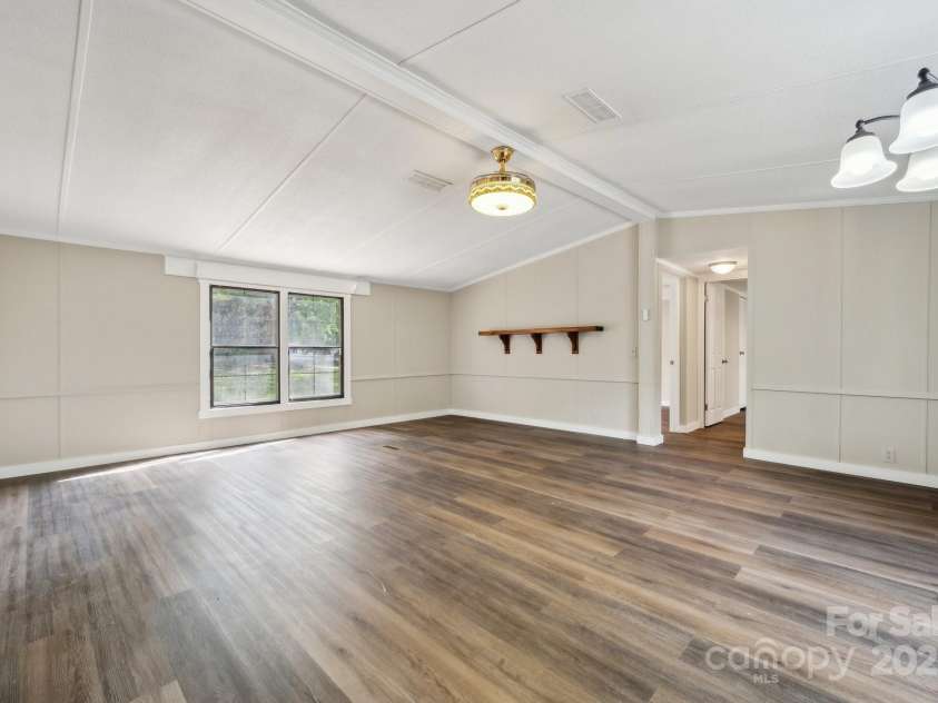 5001 Grand Canyon Road, Concord, NC 28027.  MLS# CAR4256169, YatesRealty ID 27021. Living Room