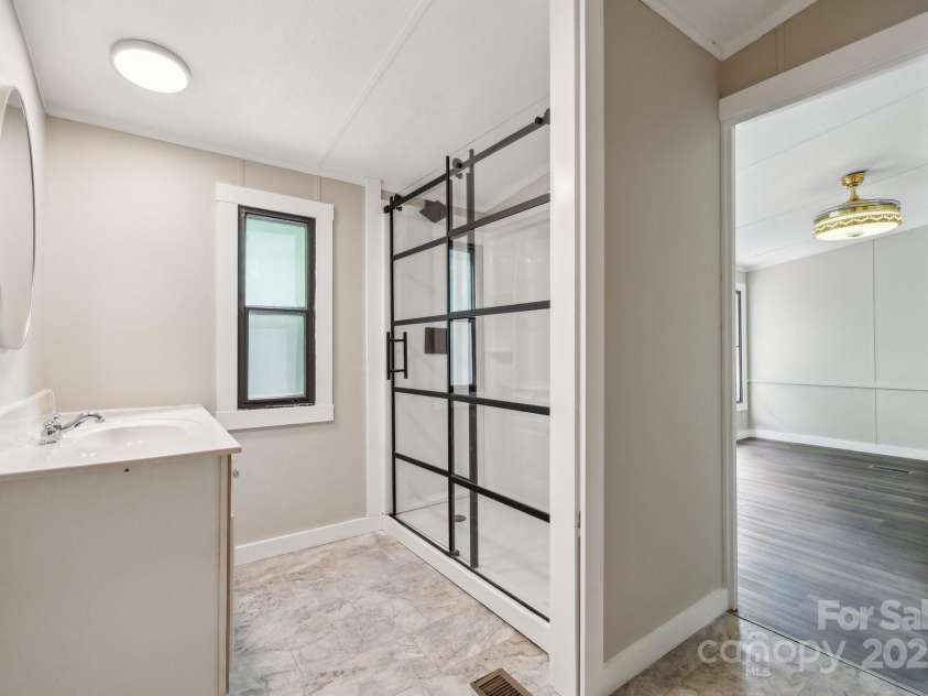 5001 Grand Canyon Road, Concord, NC 28027.  MLS# CAR4256169, YatesRealty ID 27021. Primary Bathroom