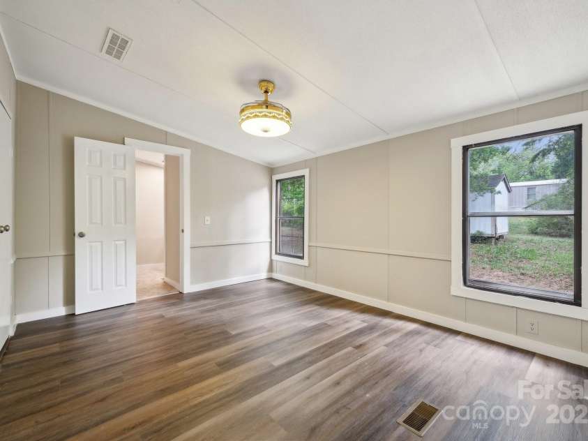 5001 Grand Canyon Road, Concord, NC 28027.  MLS# CAR4256169, YatesRealty ID 27021. Primary Bedroom