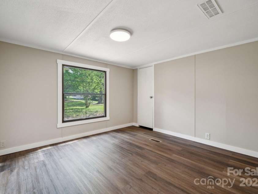 5001 Grand Canyon Road, Concord, NC 28027.  MLS# CAR4256169, YatesRealty ID 27021. Second Guest Bedroom