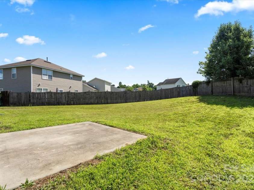 7136 Bullock Drive, Charlotte, NC 28214.  MLS# CAR4272820, YatesRealty ID 27025. Spacious Rear Yard-partially fenced