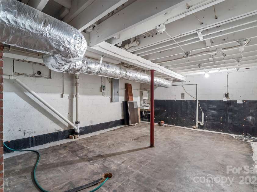 17 Park Road, Asheville, NC 28803.  MLS# CAR4278105, YatesRealty ID 27028. Basement w/sink