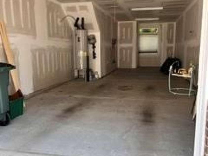 566 West End Drive, Charlotte, NC 28208.  MLS# CAR4359190, YatesRealty ID 27030. Large 2 car garage