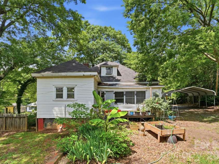 1815 Hemlock Avenue, Gastonia, NC 28054.  MLS# CAR4383647, YatesRealty ID 27033. Backyard w/Deck and Garden