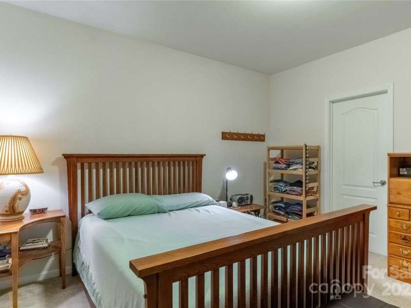 332 Appeldoorn Circle, Asheville, NC 28803.  MLS# CAR4279509, YatesRealty ID 27033. Primary bedroom facing closet door