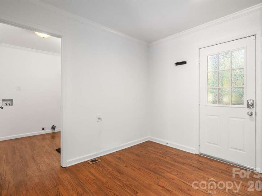 4300 Dowling Drive, Charlotte, NC 28205.  MLS# CAR4382193, YatesRealty ID 27034. Laundry Room with storage and nook for kitchen table