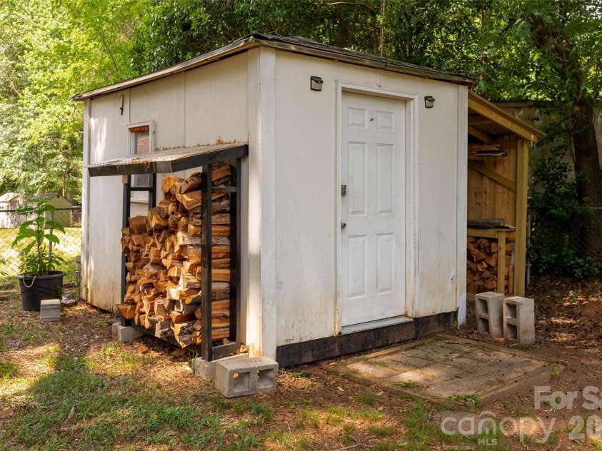 4300 Dowling Drive, Charlotte, NC 28205.  MLS# CAR4382193, YatesRealty ID 27034. Shed is equipped with power