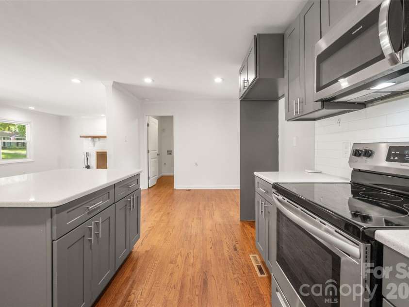 4300 Dowling Drive, Charlotte, NC 28205.  MLS# CAR4382193, YatesRealty ID 27034. Well designed layout + nice size island