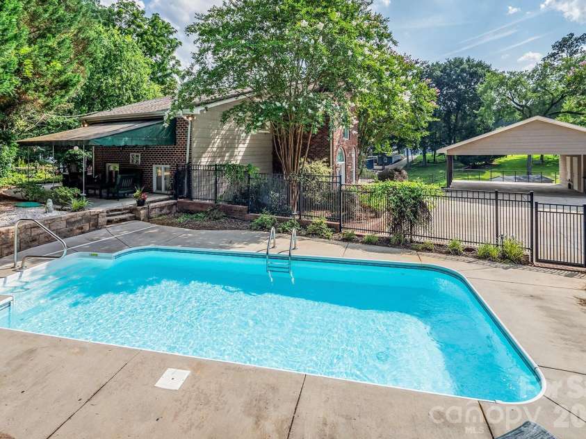 24756 Strand Drive, Albemarle, NC 28001.  MLS# CAR4367629, YatesRealty ID 27039. Inground pool