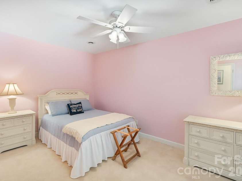 24756 Strand Drive, Albemarle, NC 28001.  MLS# CAR4367629, YatesRealty ID 27039. Upper level secondary bedroom.