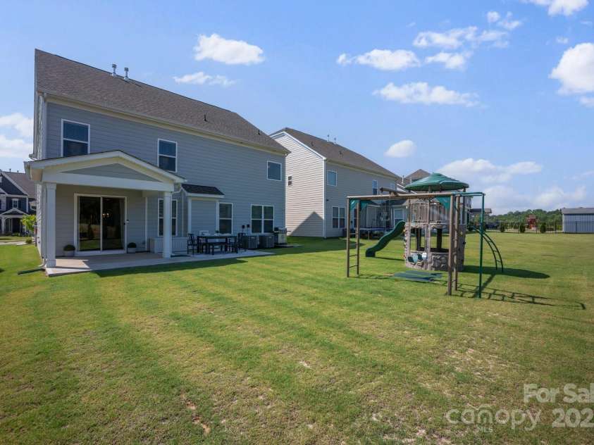 187 Tetcott Street, Mooresville, NC 28115.  MLS# CAR4278283, YatesRealty ID 27048. Large yard