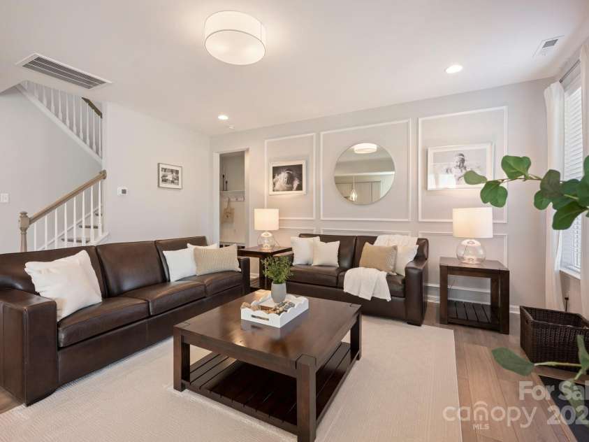 187 Tetcott Street, Mooresville, NC 28115.  MLS# CAR4278283, YatesRealty ID 27048. Living Room with Custom Moldings