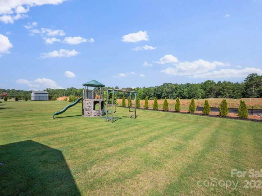 187 Tetcott Street, Mooresville, NC 28115.  MLS# CAR4278283, YatesRealty ID 27048. Trees planted for added privacy